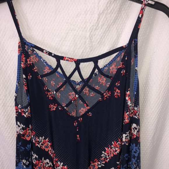 Floral Dress in a size Medium with back and angular detailing - Picture 3 of 9